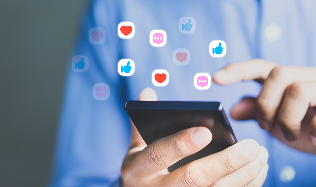 Man interacting with his phone on social media